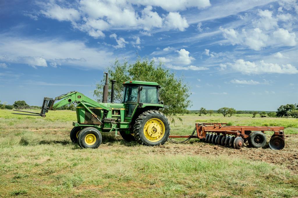 1 West Pleasant Valley Road Bellevue, TX 76228 - Photo 38 of 40 a view of a wooden house with a outdoor space