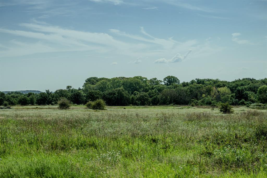1 West Pleasant Valley Road Bellevue, TX 76228 - Photo 39 of 40 a big yard with lots of green space