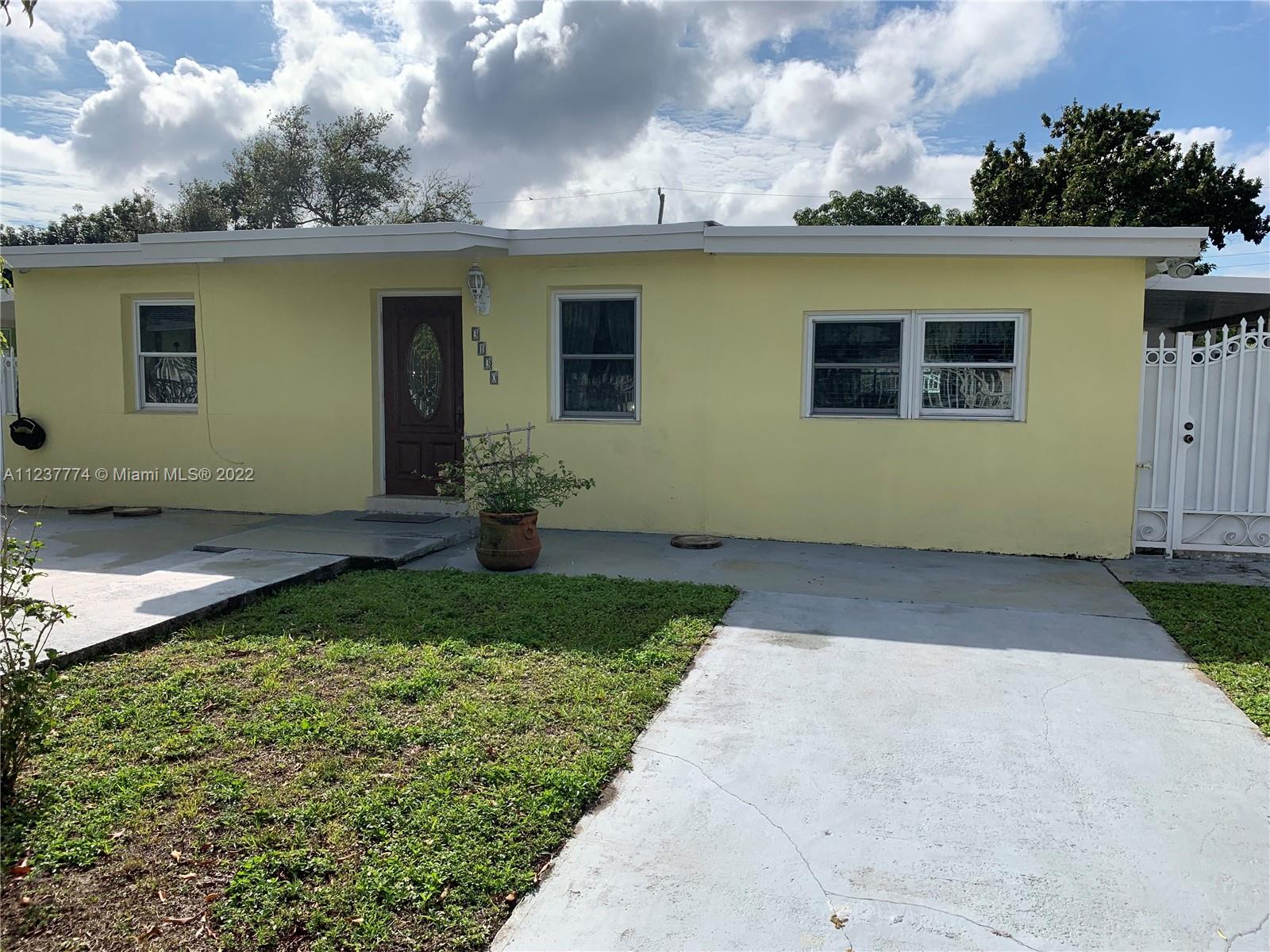 a house view with a garden space