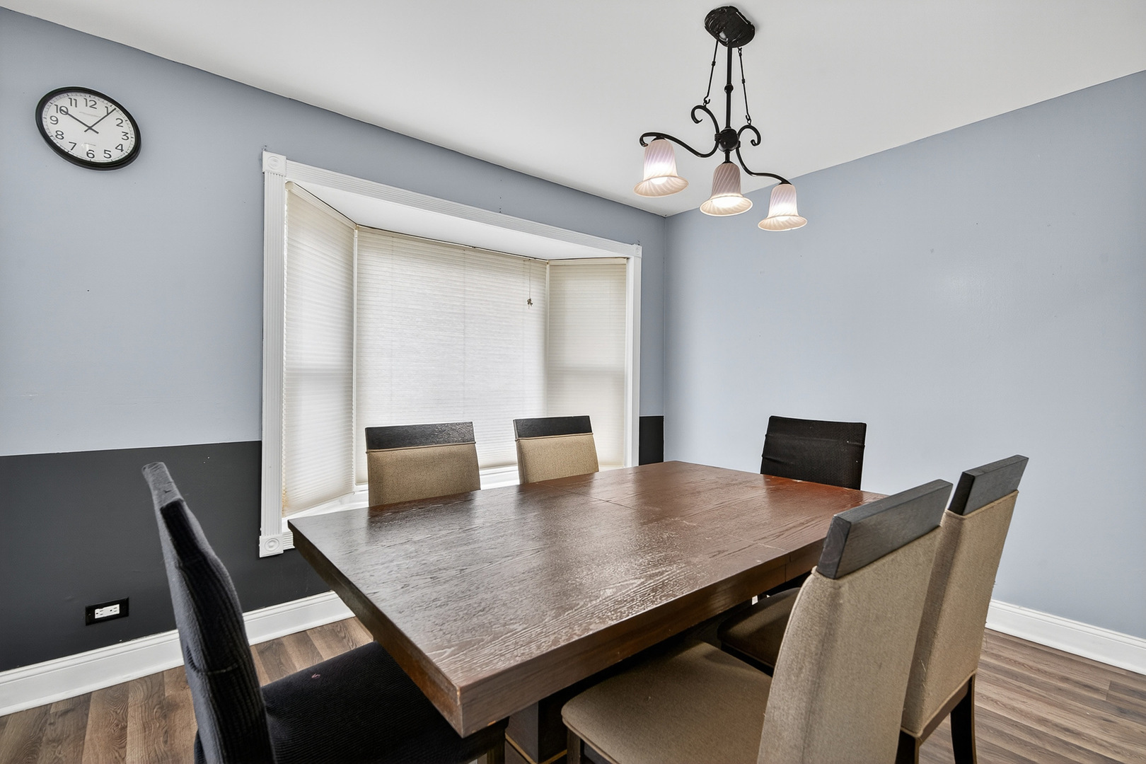 535 Jordan Way Bolingbrook, IL 60440 - Photo 11 of 35 a view of a dining room with a table and chairs