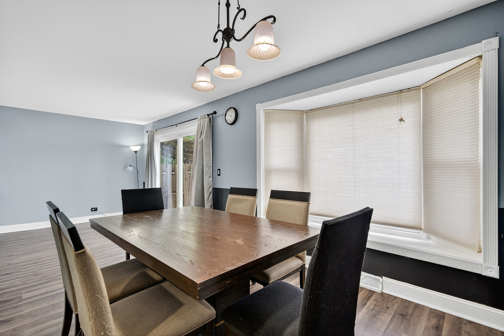 535 Jordan Way Bolingbrook, IL 60440 - Photo 12 of 35 a view of a dining room with furniture and wooden floor