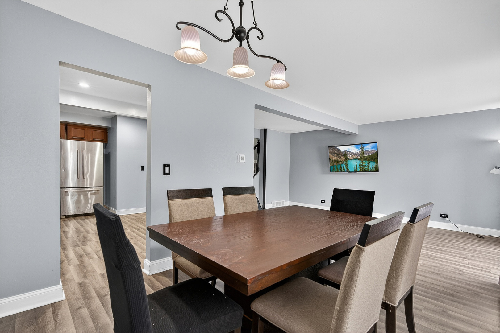 535 Jordan Way Bolingbrook, IL 60440 - Photo 13 of 35 a view of a dining room with furniture and wooden floor