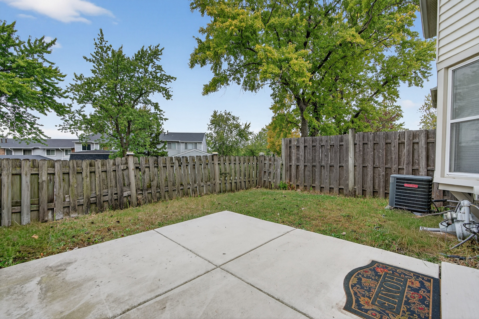 535 Jordan Way Bolingbrook, IL 60440 - Photo 31 of 35 a view of a backyard with wooden fence