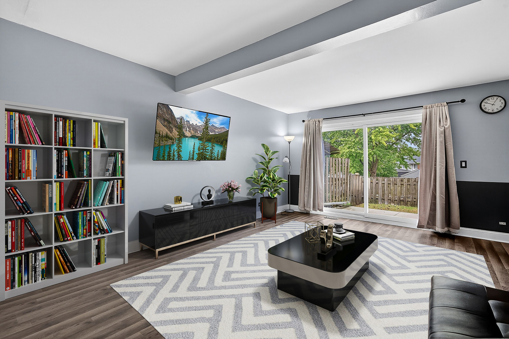 535 Jordan Way Bolingbrook, IL 60440 - Photo 8 of 35 a living room with furniture and a flat screen tv