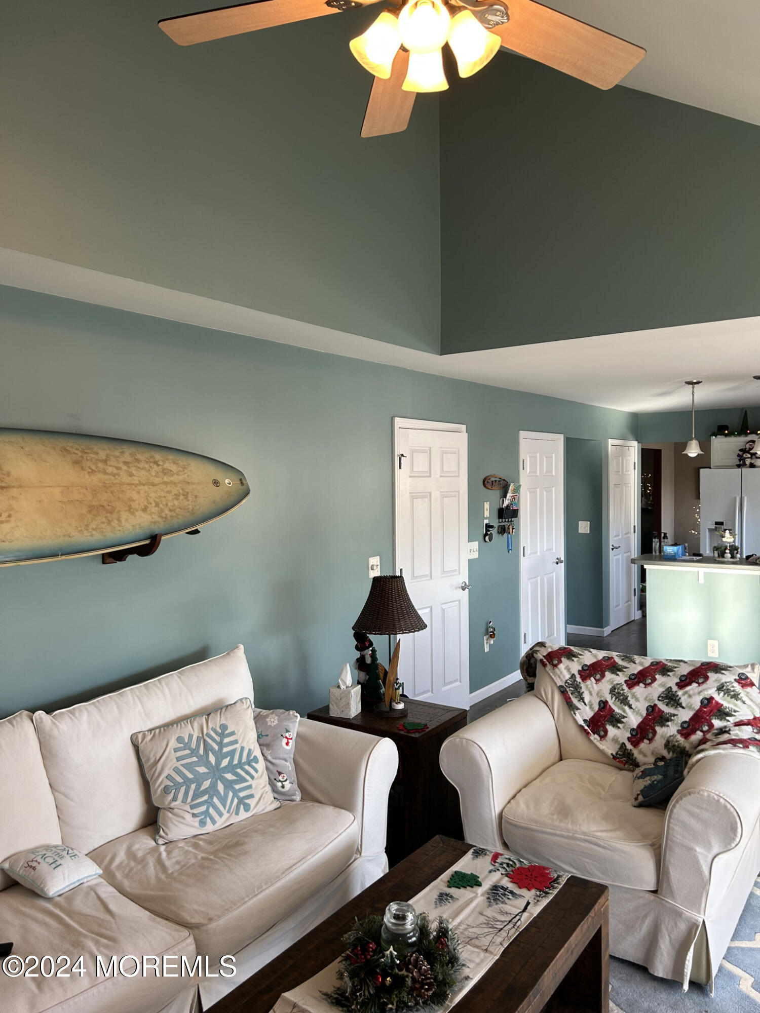 141 Marlin Road Manahawkin, NJ 08050 - Photo 18 of 33 a living room with furniture and a lamp