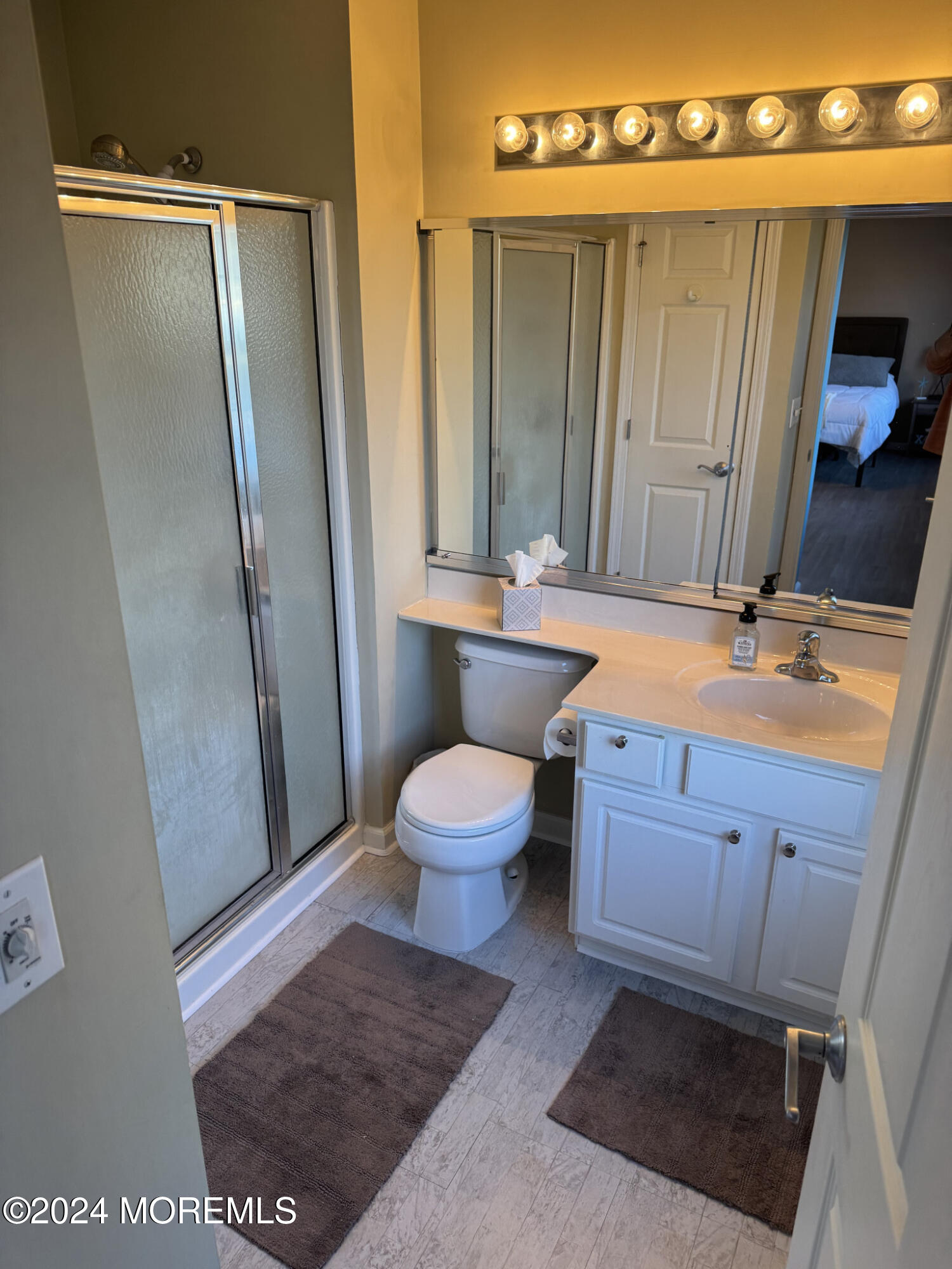 141 Marlin Road Manahawkin, NJ 08050 - Photo 25 of 33 a bathroom with a toilet a sink and a shower