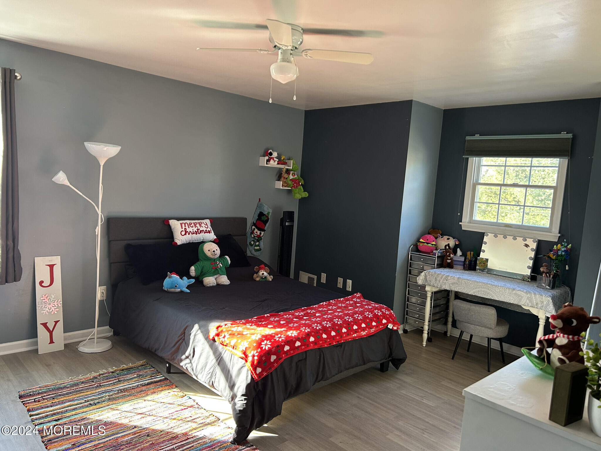 141 Marlin Road Manahawkin, NJ 08050 - Photo 27 of 33 a bedroom with a bed and wooden floor