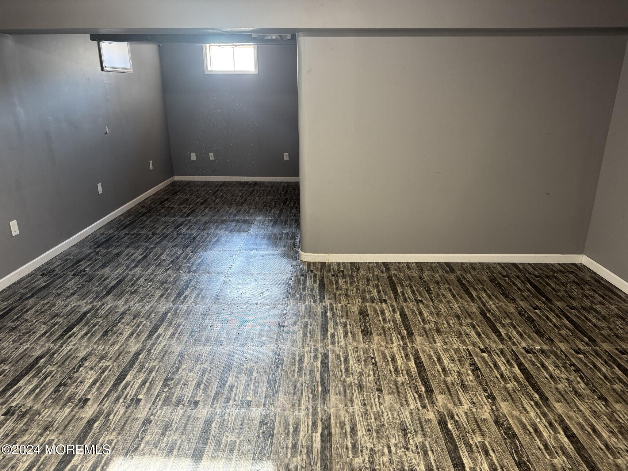 141 Marlin Road Manahawkin, NJ 08050 - Photo 32 of 33 a view of a room with wooden floor