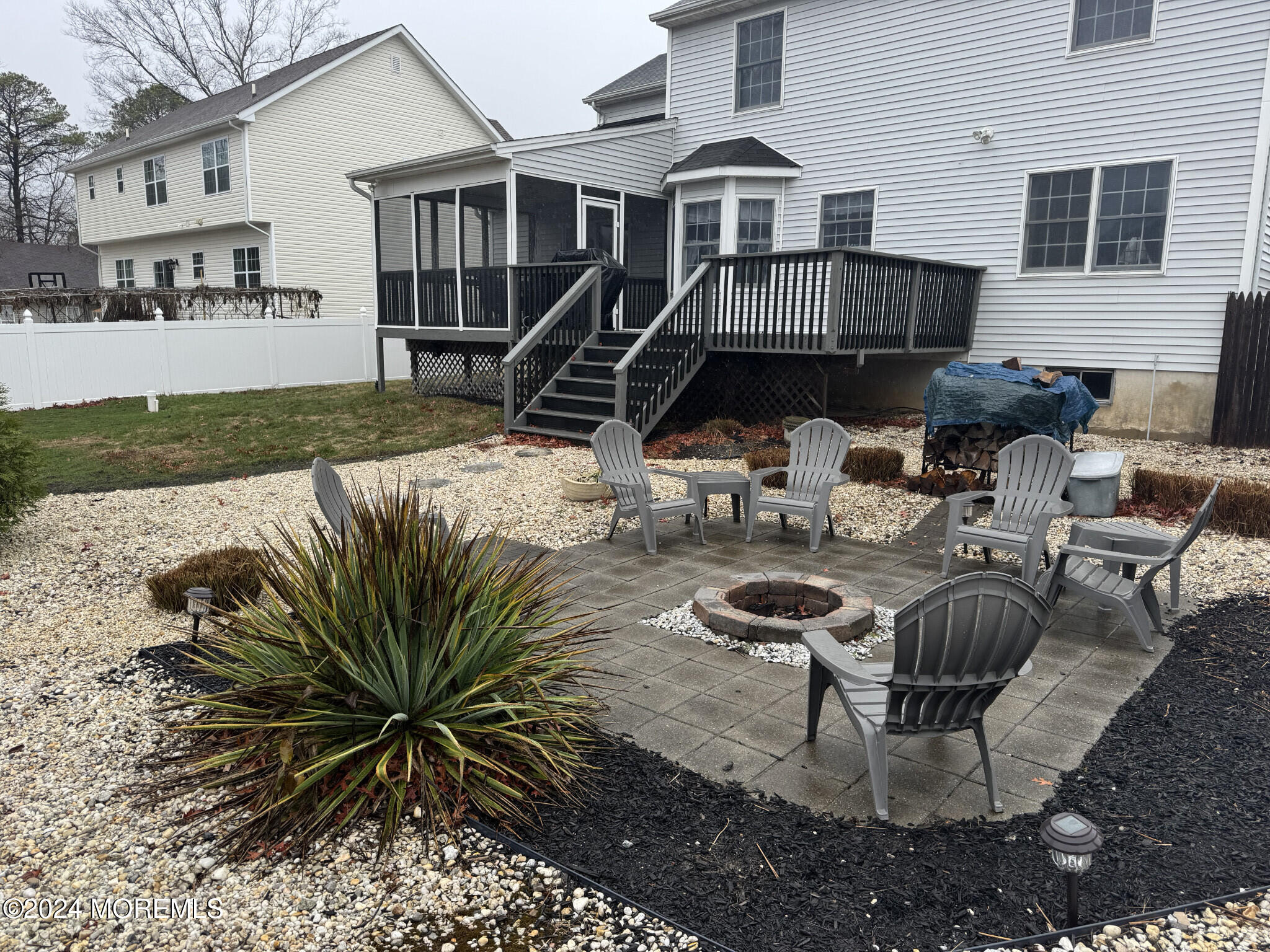 141 Marlin Road Manahawkin, NJ 08050 - Photo 5 of 33 a view of a house with backyard and sitting area