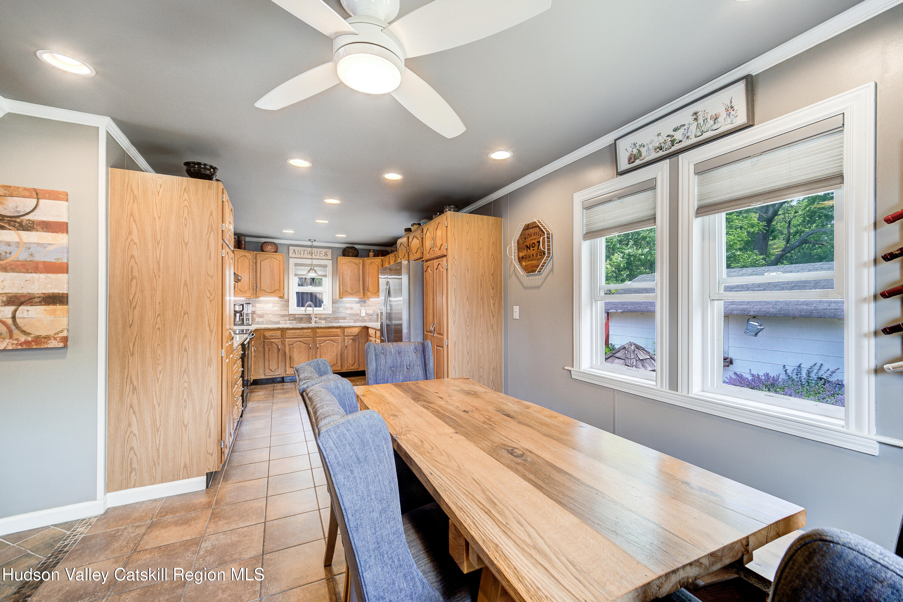 2-6 Old Firehouse Road Plattekill, NY 12589 - Photo 13 of 44 a large kitchen with kitchen island a large window cabinets a sink and stainless steel appliances