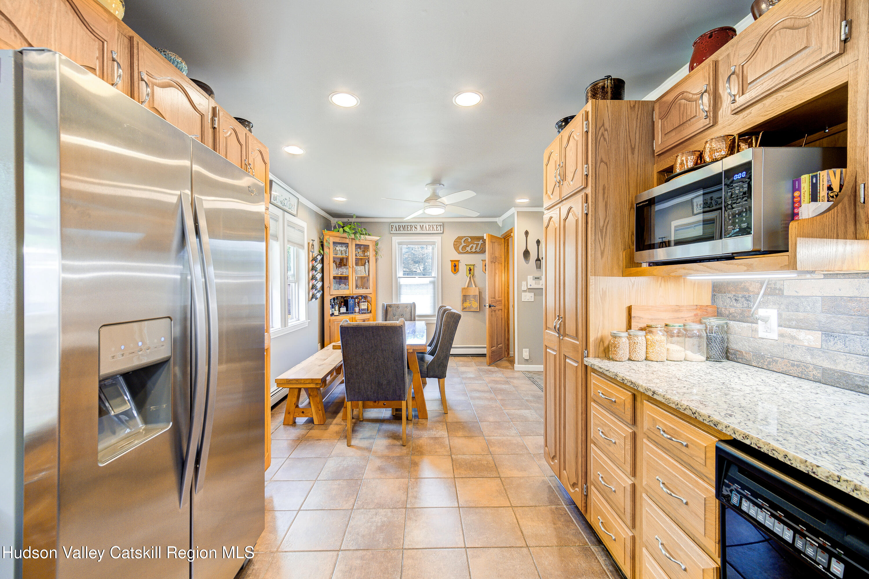 2-6 Old Firehouse Road Plattekill, NY 12589 - Photo 16 of 44 a open kitchen with stainless steel appliances granite countertop a stove a sink and a microwave