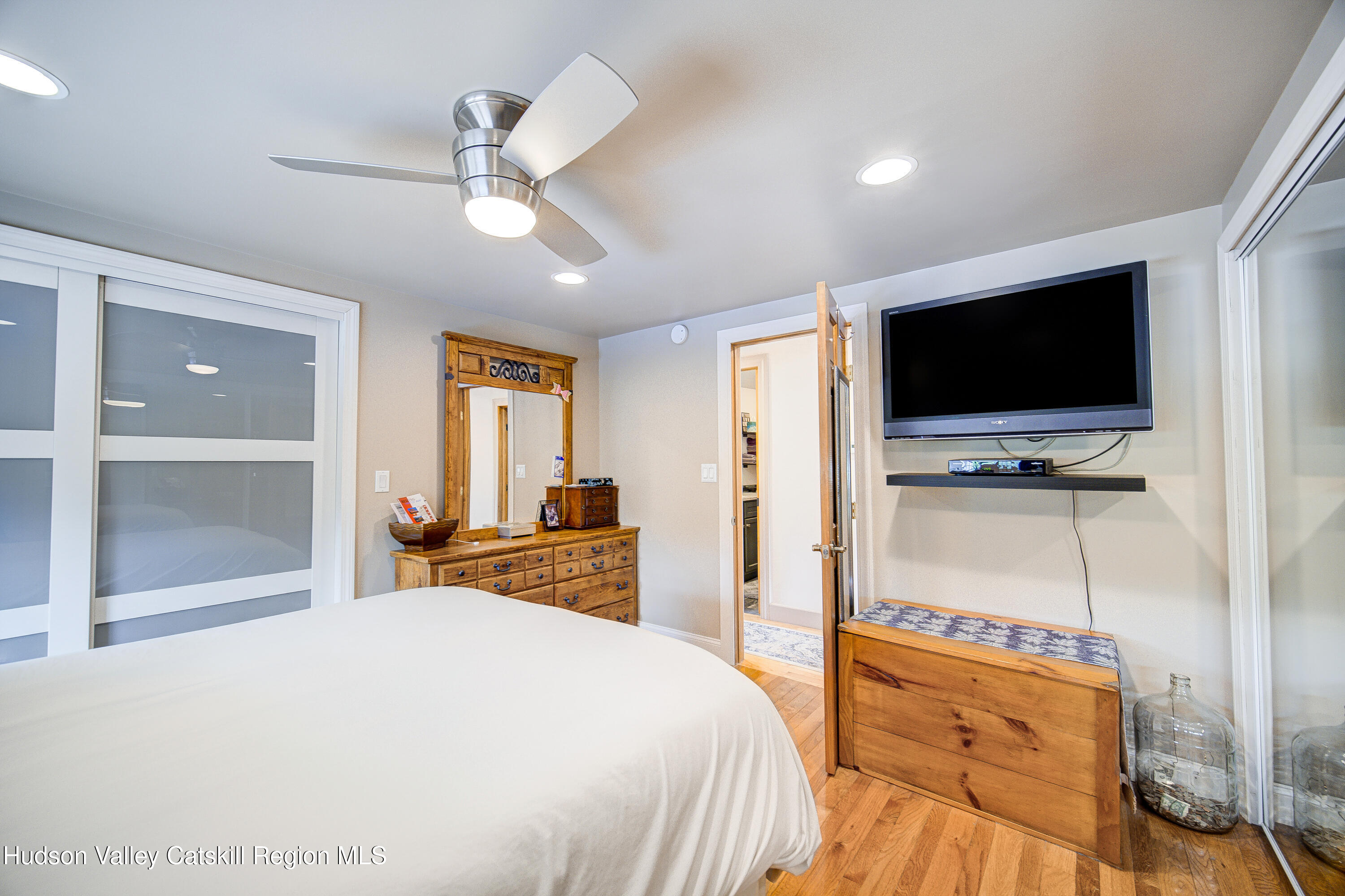 2-6 Old Firehouse Road Plattekill, NY 12589 - Photo 31 of 44 a bedroom with a bed and a flat screen tv