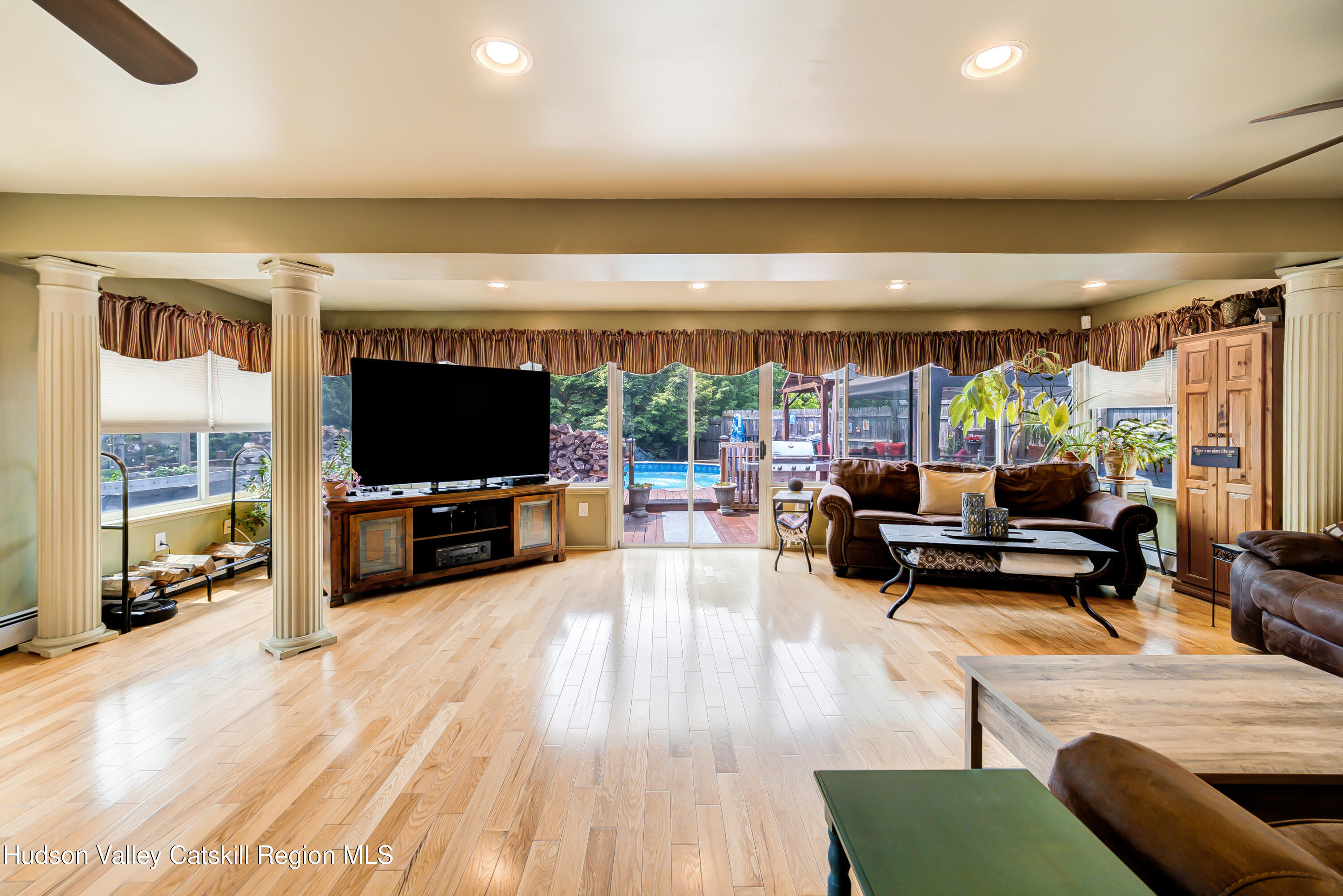 2-6 Old Firehouse Road Plattekill, NY 12589 - Photo 5 of 44 a living room with furniture and a flat screen tv
