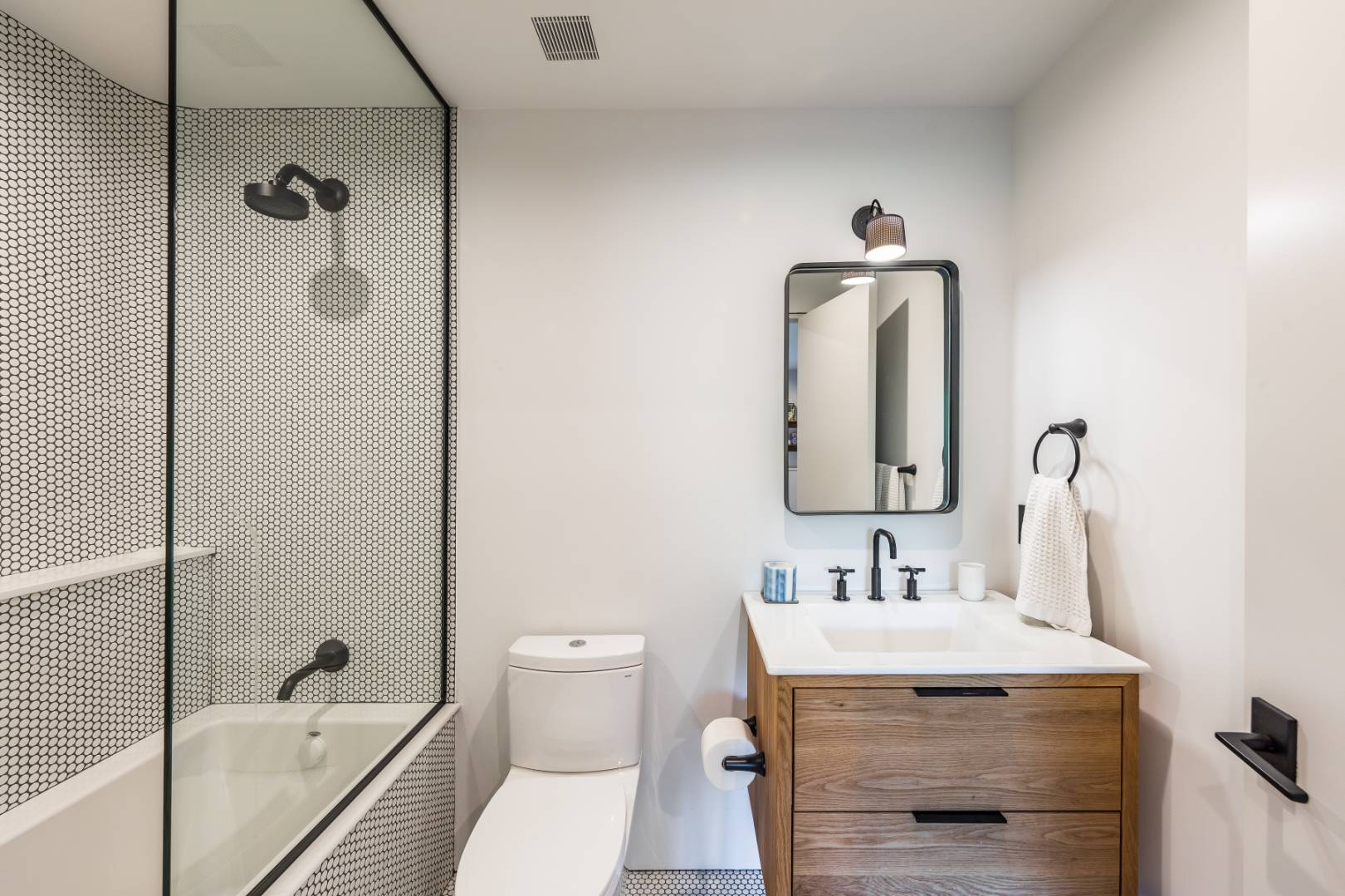 6 Tara Road Montauk, NY 11954 - Photo 13 of 24 a bathroom with a sink toilet and shower