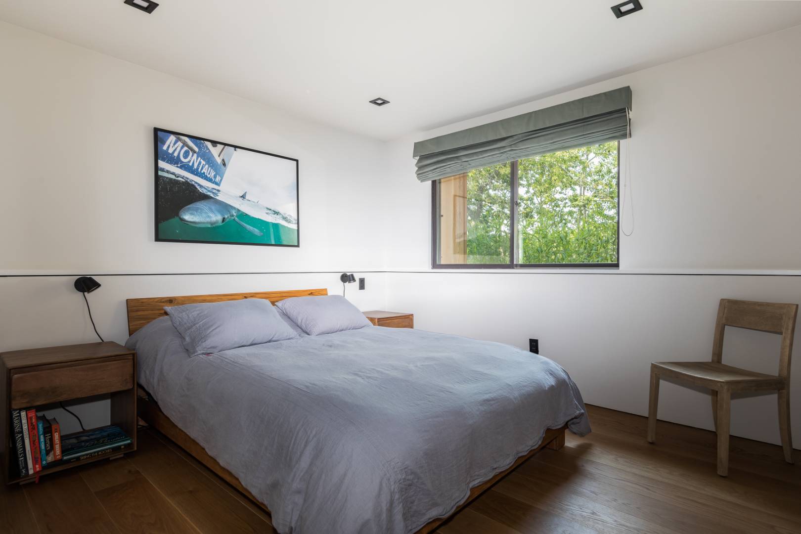 6 Tara Road Montauk, NY 11954 - Photo 16 of 24 a bedroom with a bed and a window