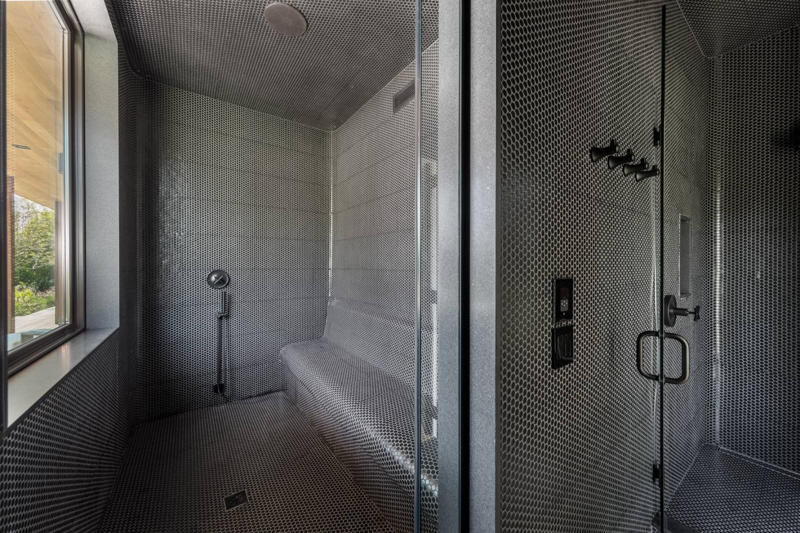 6 Tara Road Montauk, NY 11954 - Photo 22 of 24 a bathroom with a bathtub and shower