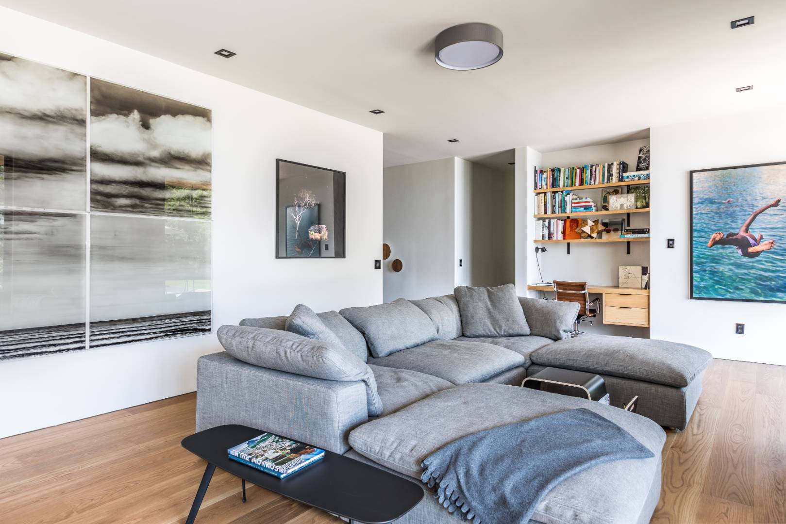 6 Tara Road Montauk, NY 11954 - Photo 10 of 24 a living room with furniture and a flat screen tv
