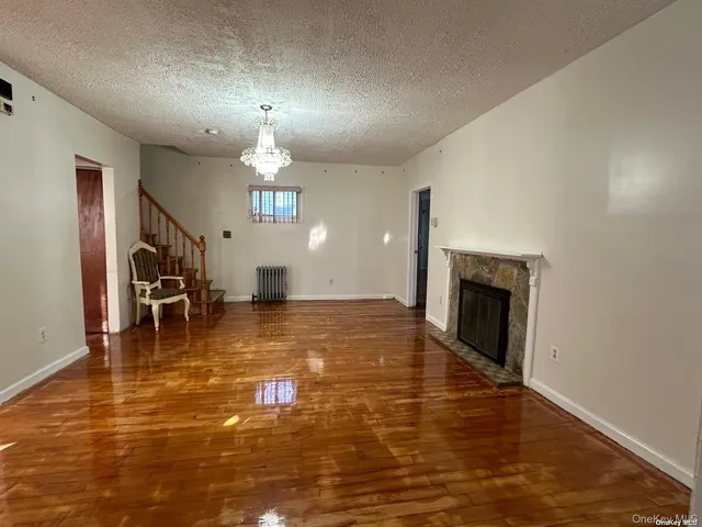 a view of a livingroom with a fireplace