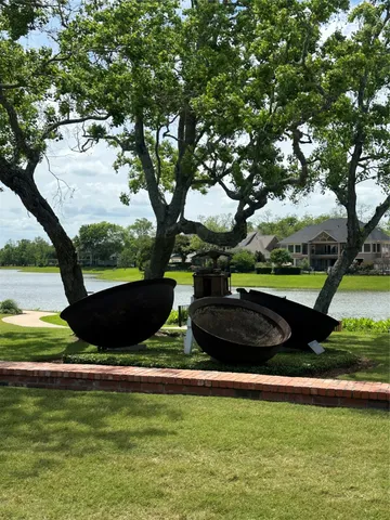 a view of a lake with a big yard