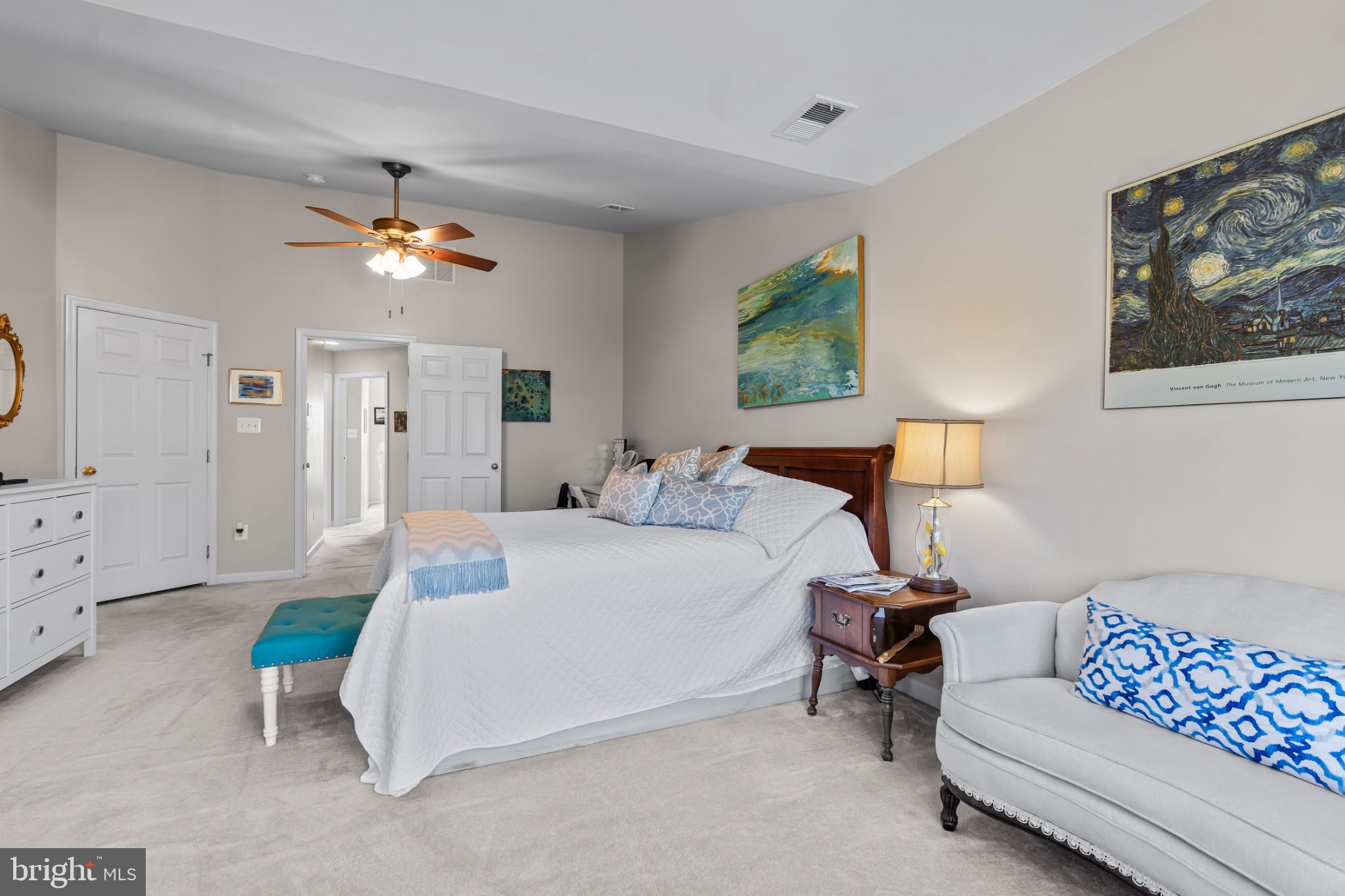 17656 Potter Bell Way Hagerstown, MD 21740 - Photo 18 of 35 a bedroom with a bed mirror and couch