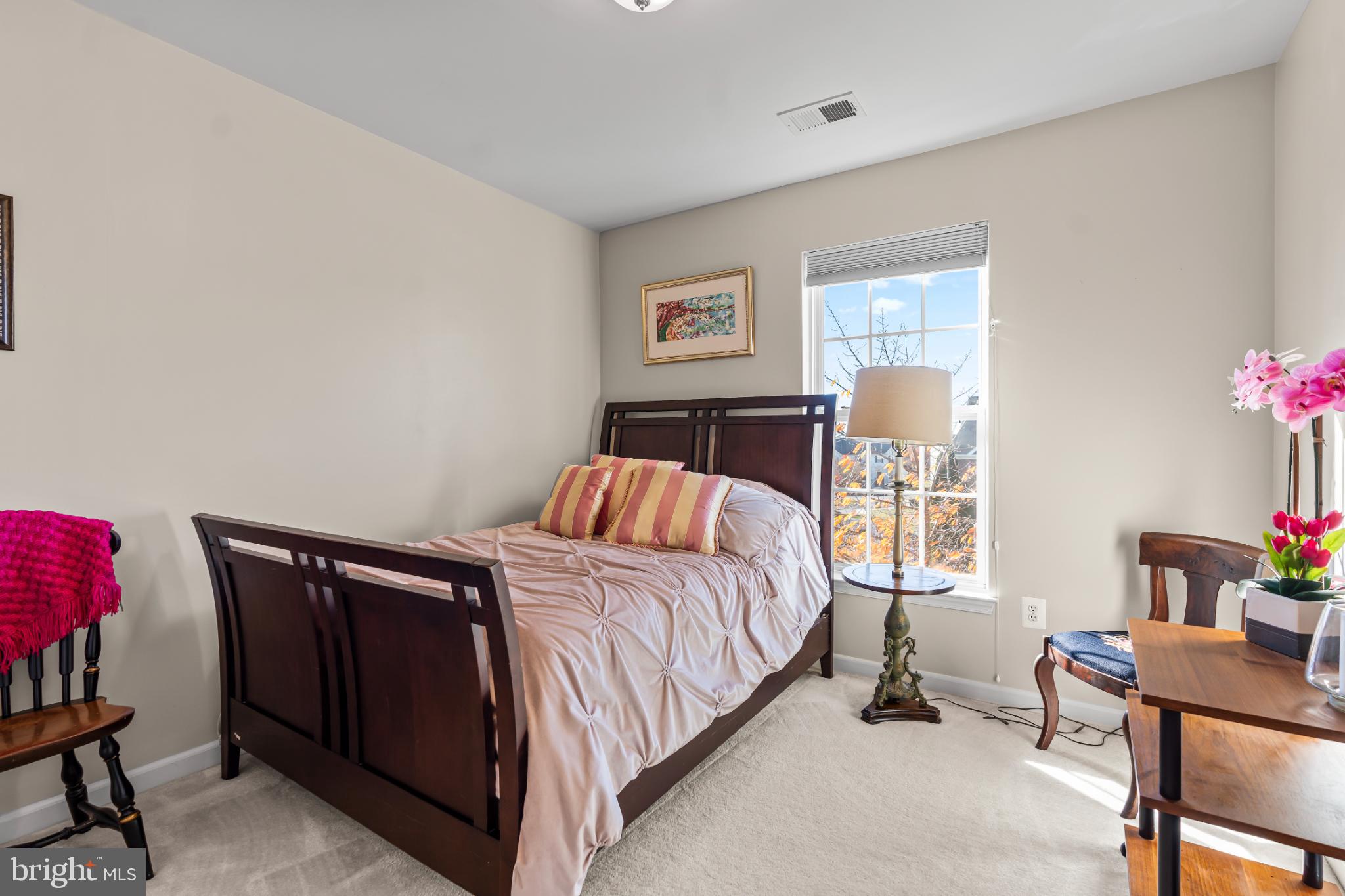 17656 Potter Bell Way Hagerstown, MD 21740 - Photo 22 of 35 a bedroom with a bed and a table in it with window