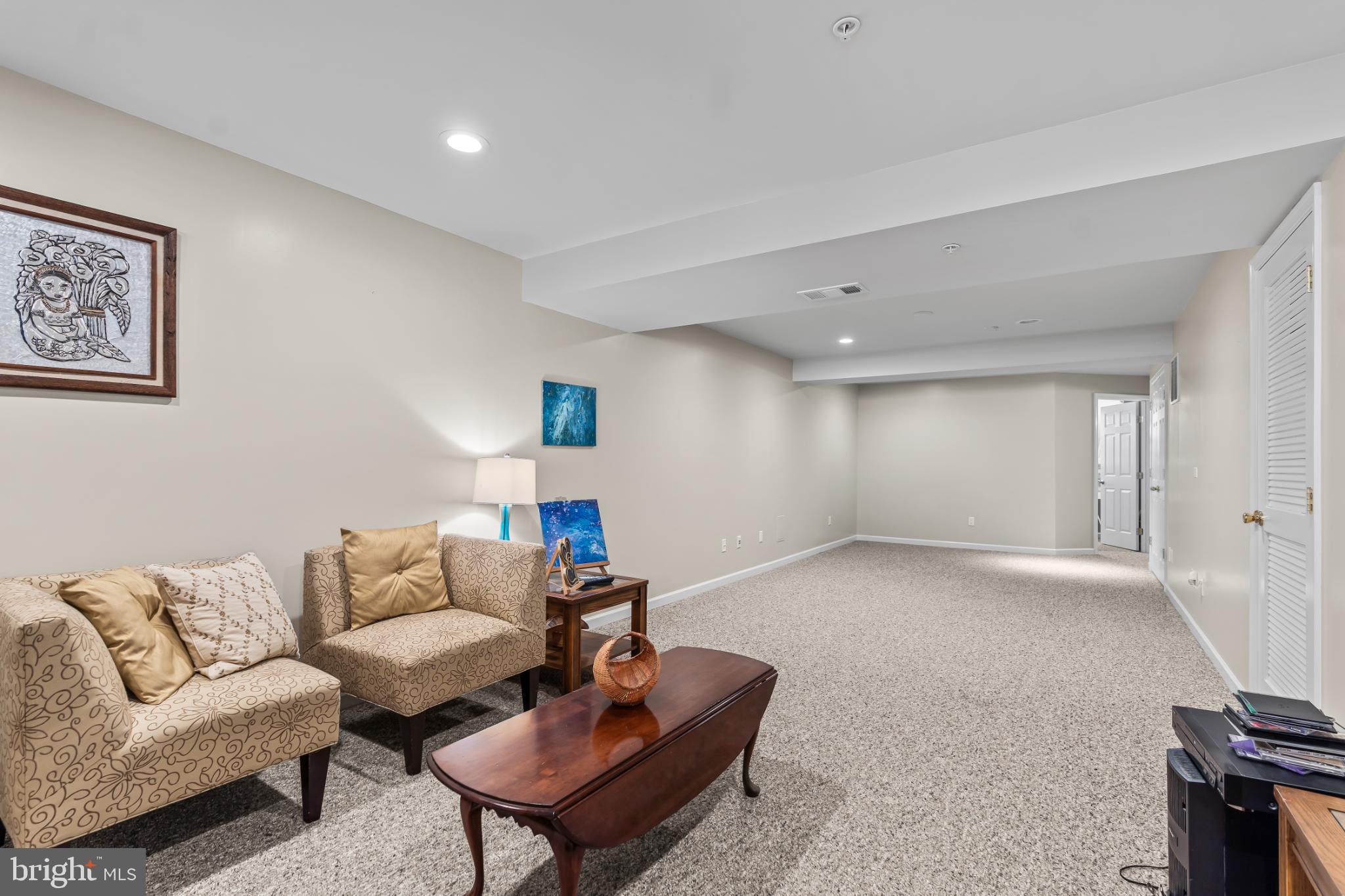 17656 Potter Bell Way Hagerstown, MD 21740 - Photo 26 of 35 a living room with furniture and a table