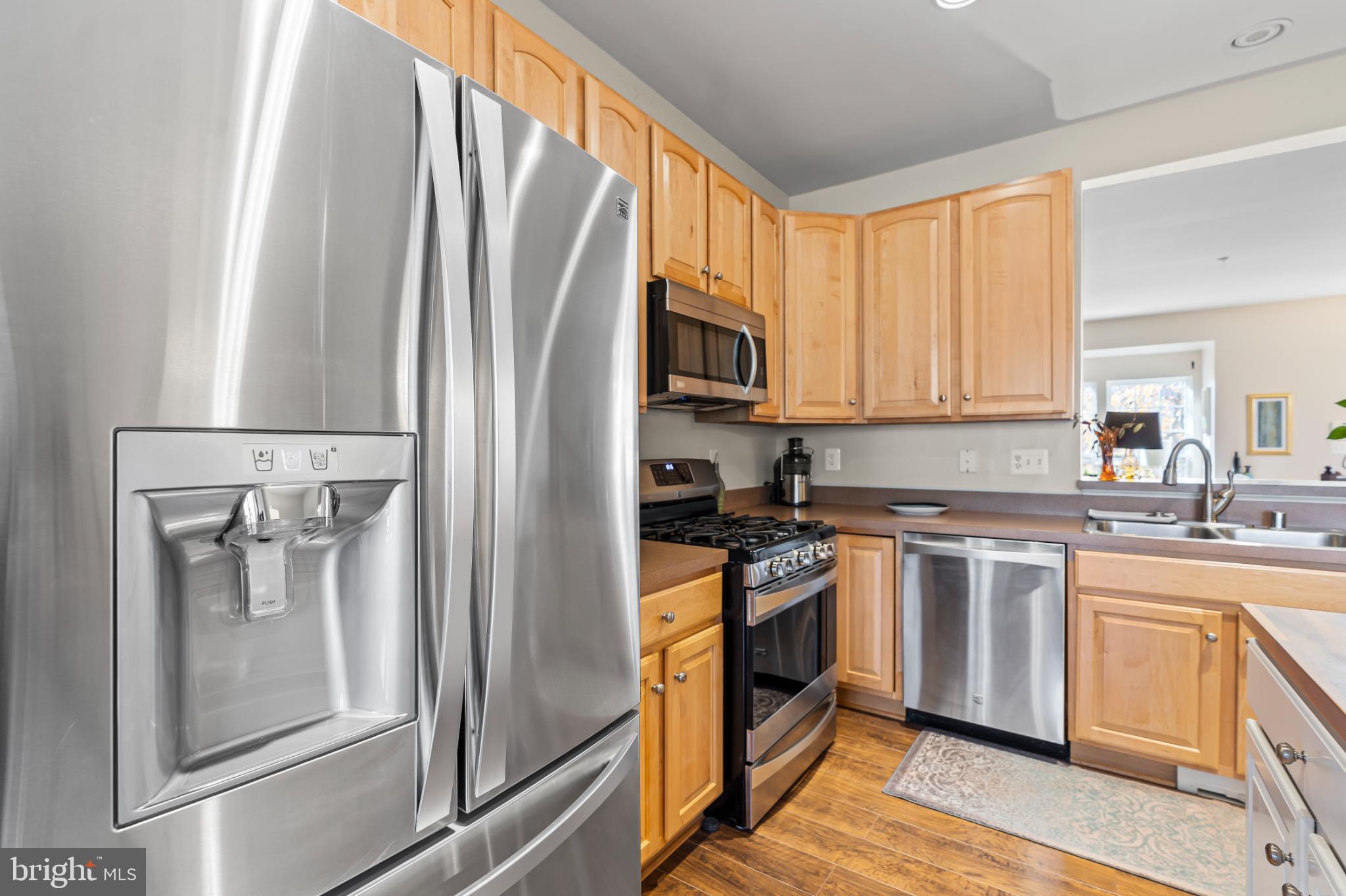 17656 Potter Bell Way Hagerstown, MD 21740 - Photo 8 of 35 a kitchen with stainless steel appliances granite countertop a refrigerator stove and sink