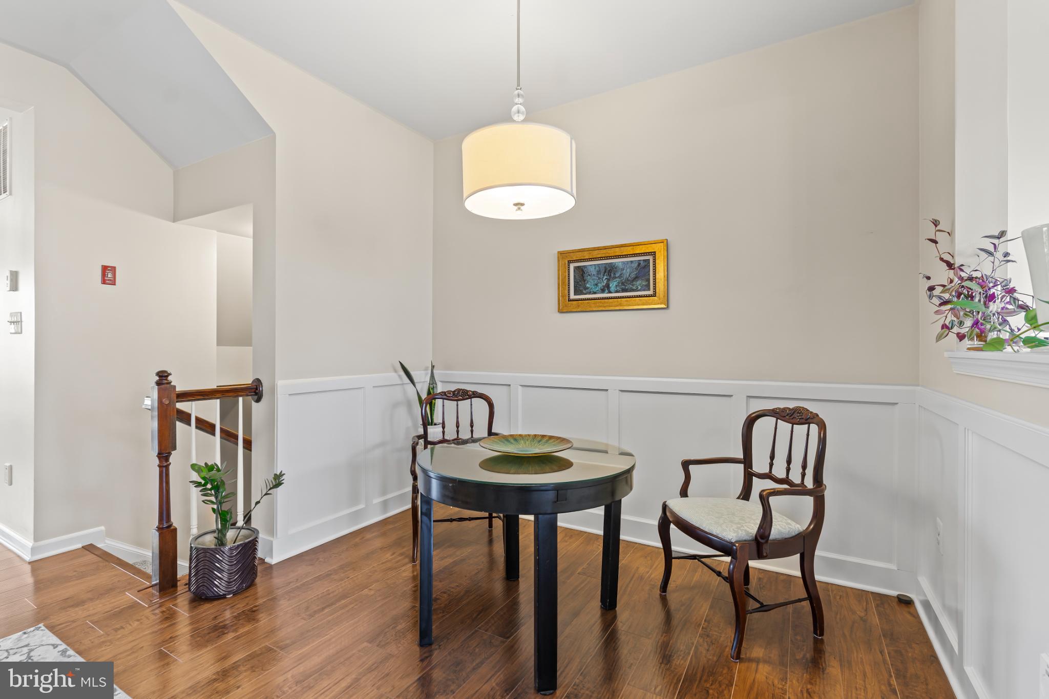 17656 Potter Bell Way Hagerstown, MD 21740 - Photo 10 of 35 a view of a dining room with furniture and wooden floor