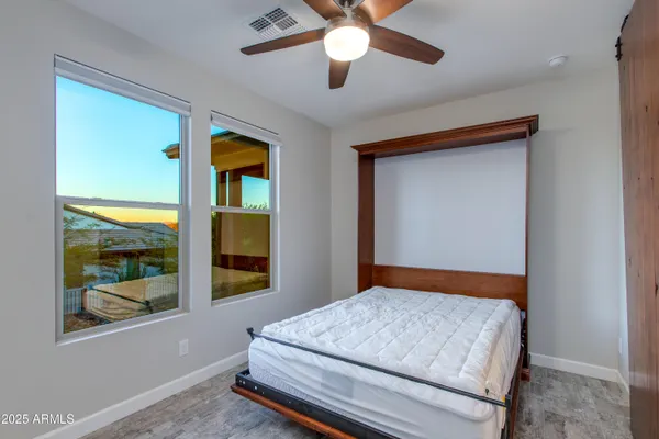 a view of a hallway with a living room