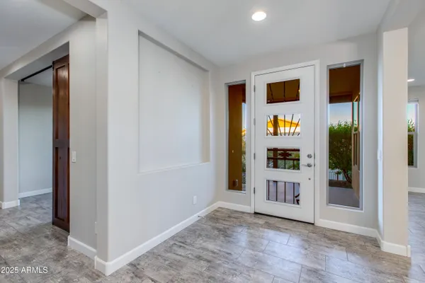 a bathroom with a sink toilet and mirror