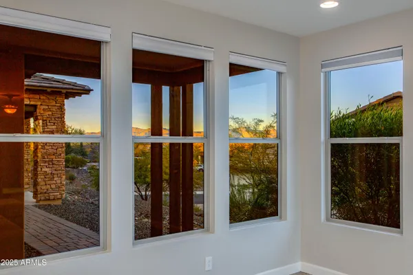 a bathroom with a shower and a window