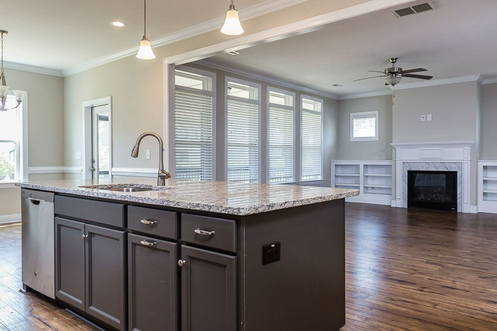 1908 Edens Ridge Avenue Wake Forest, NC 27587 - Photo 4 of 27 Entertain in the kitchen while enjoying your guests in the family room