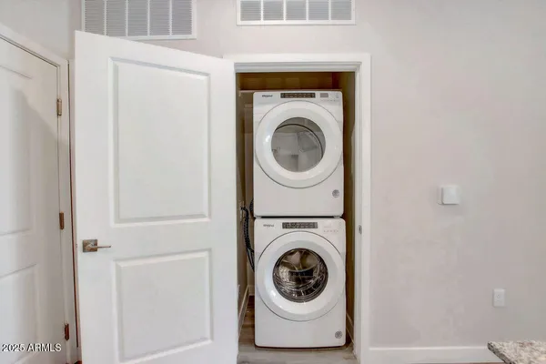 a utility room with dryer and washer