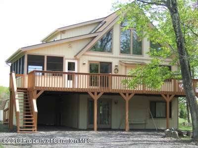 2703 Boulder Road Lake Ariel, PA 18436 - Photo 1 of 26 a front view of a house with a balcony