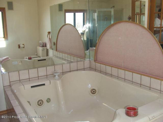 2703 Boulder Road Lake Ariel, PA 18436 - Photo 13 of 26 a bathroom with a tub