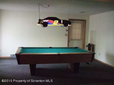 2703 Boulder Road Lake Ariel, PA 18436 - Photo 17 of 26 a room with table and chairs