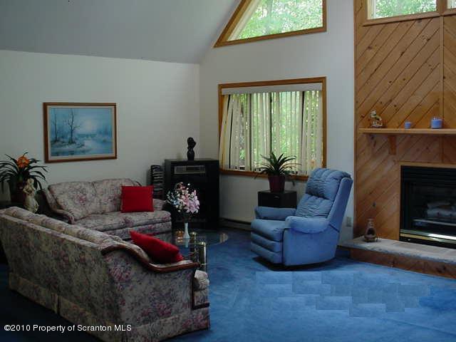 2703 Boulder Road Lake Ariel, PA 18436 - Photo 3 of 26 a living room with furniture and a fireplace