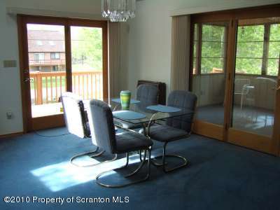 2703 Boulder Road Lake Ariel, PA 18436 - Photo 6 of 26 a living room with furniture and a floor to ceiling window