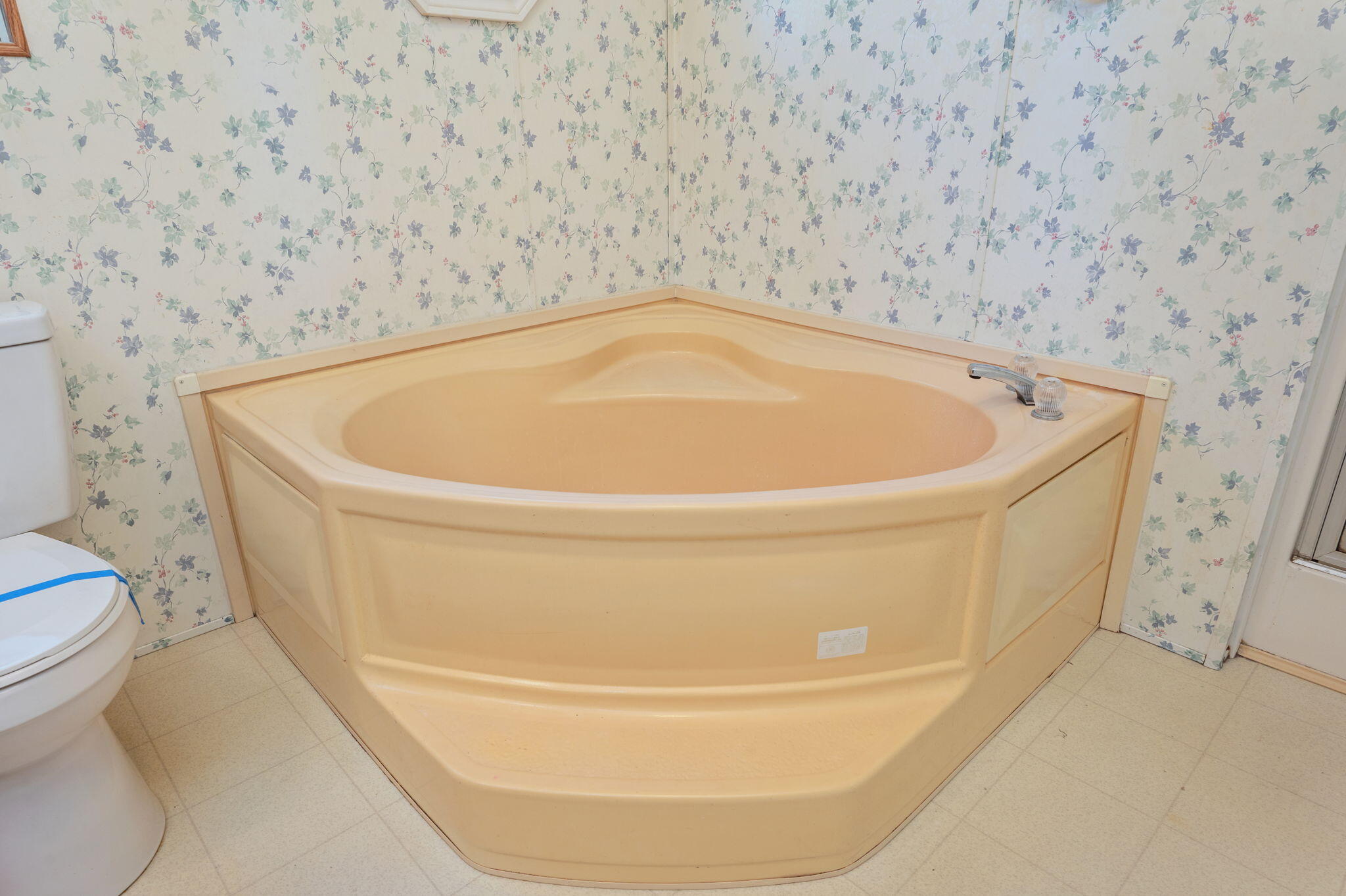 189 Benjamin Street Crestview, FL 32536 - Photo 25 of 40 a white bath tub sitting in a bathroom