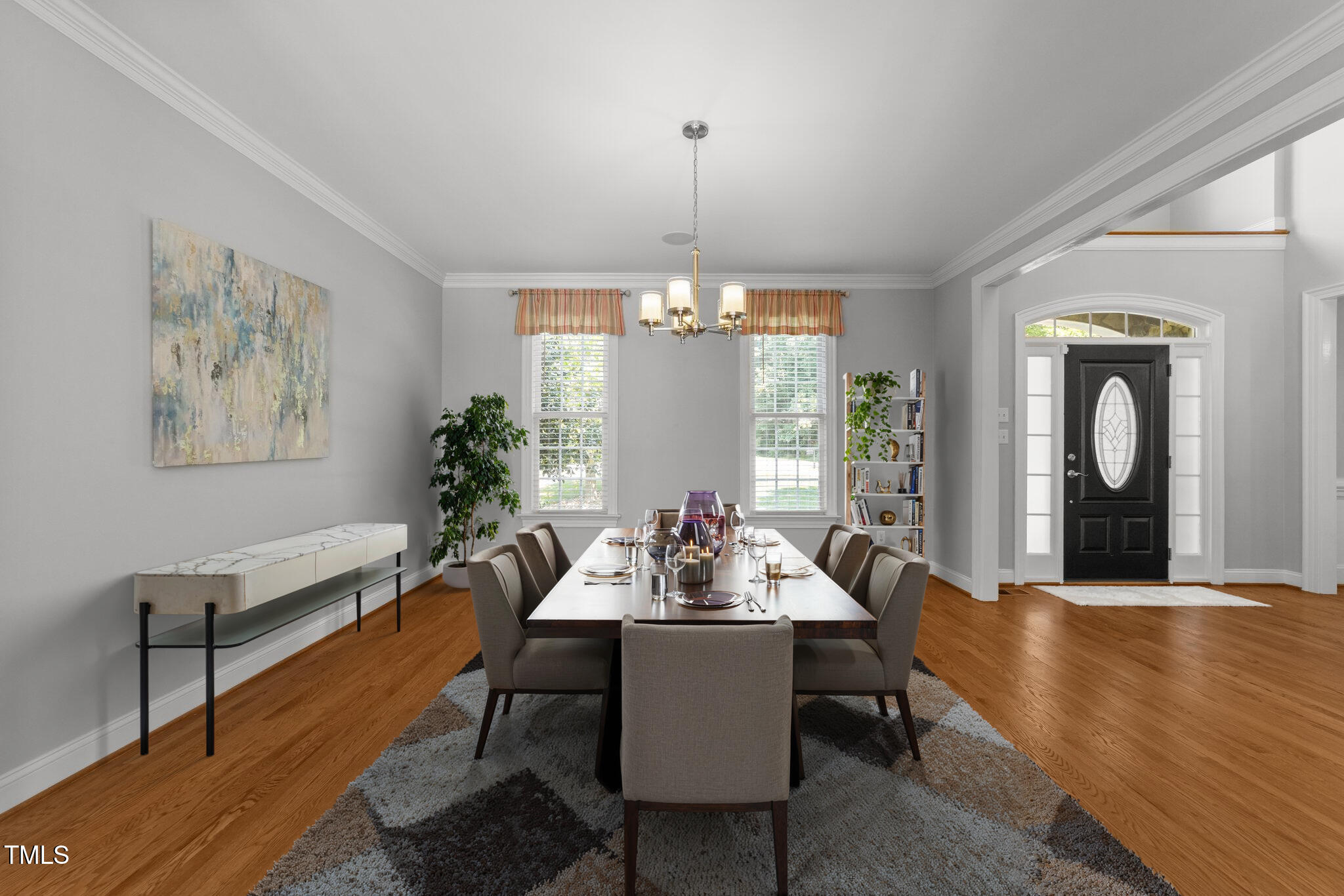 7000 Millstone Ridge Court Raleigh, NC 27614 - Photo 23 of 70 a view of a dining room with furniture window and wooden floor