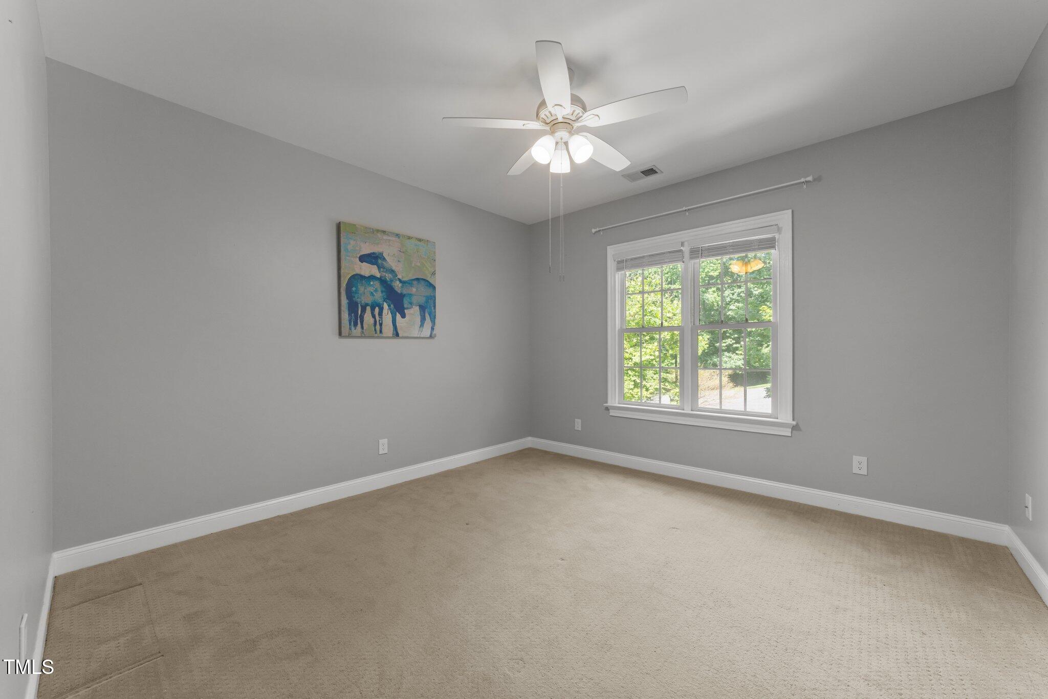 7000 Millstone Ridge Court Raleigh, NC 27614 - Photo 33 of 70 an empty room with a window