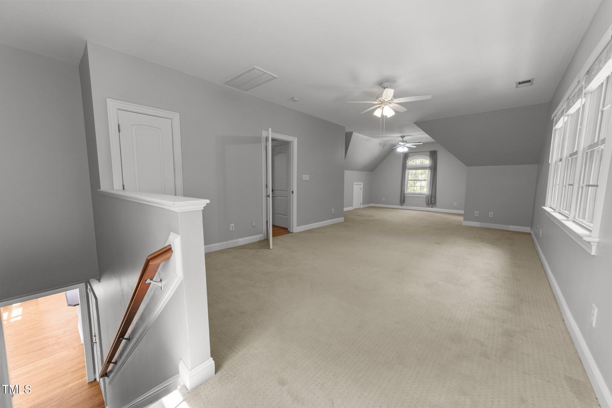 7000 Millstone Ridge Court Raleigh, NC 27614 - Photo 38 of 70 wooden floor in an empty room with a window