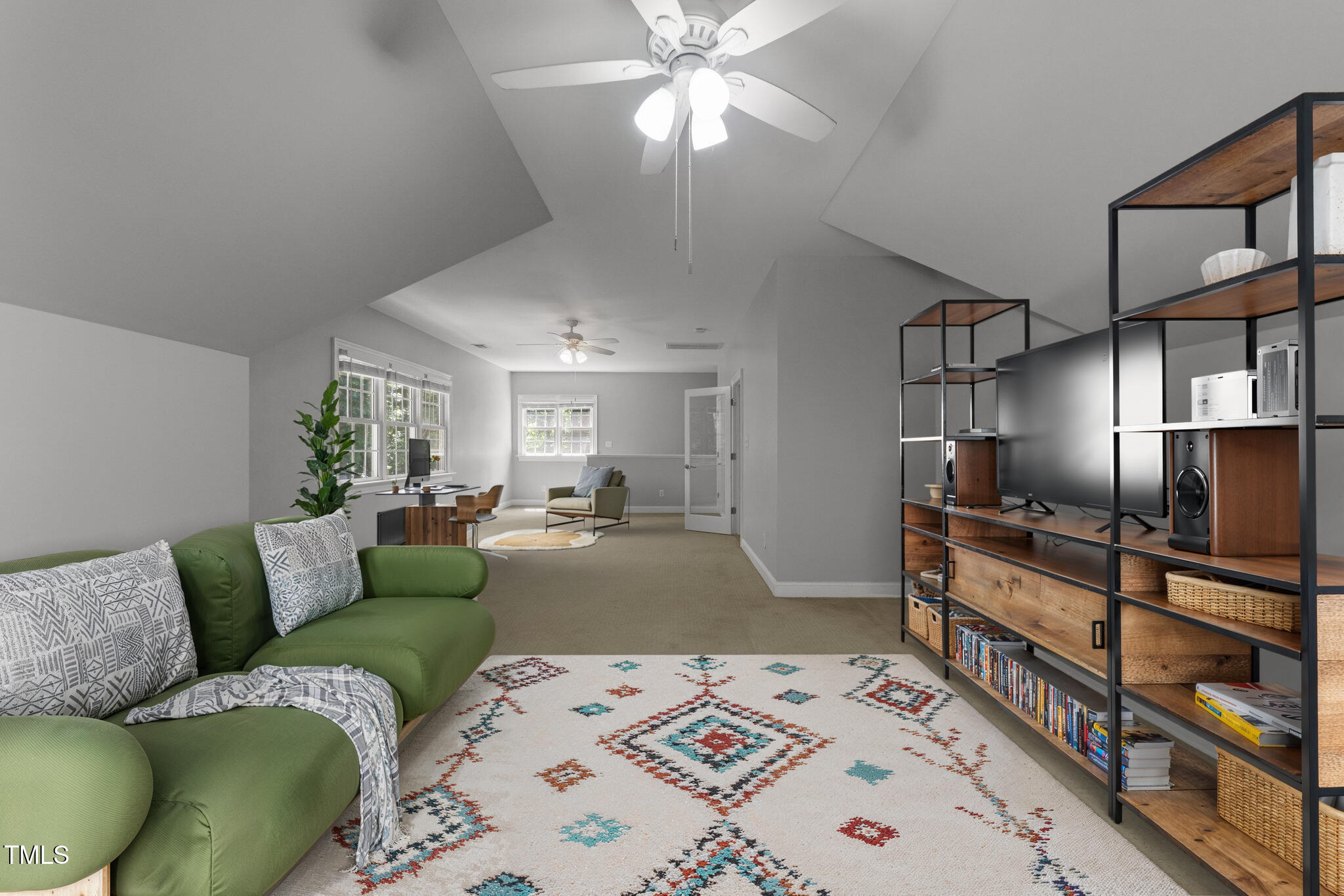 7000 Millstone Ridge Court Raleigh, NC 27614 - Photo 39 of 70 a living room with furniture and a flat screen tv