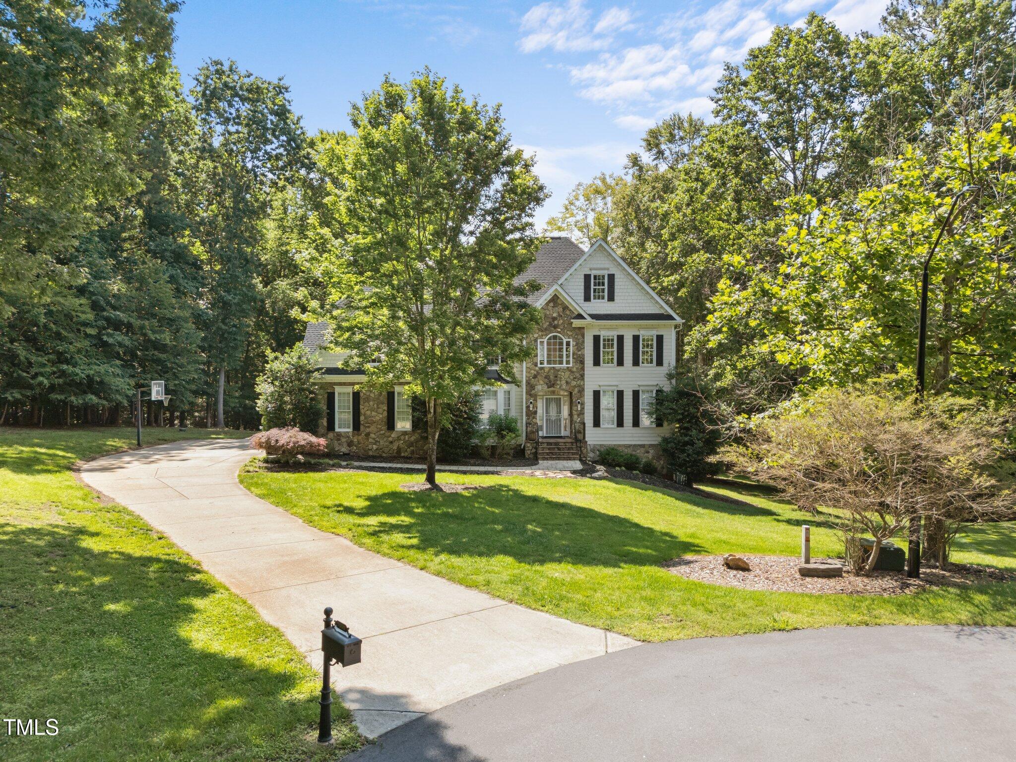 7000 Millstone Ridge Court Raleigh, NC 27614 - Photo 4 of 70 a view of a house with swimming pool and next to a yard