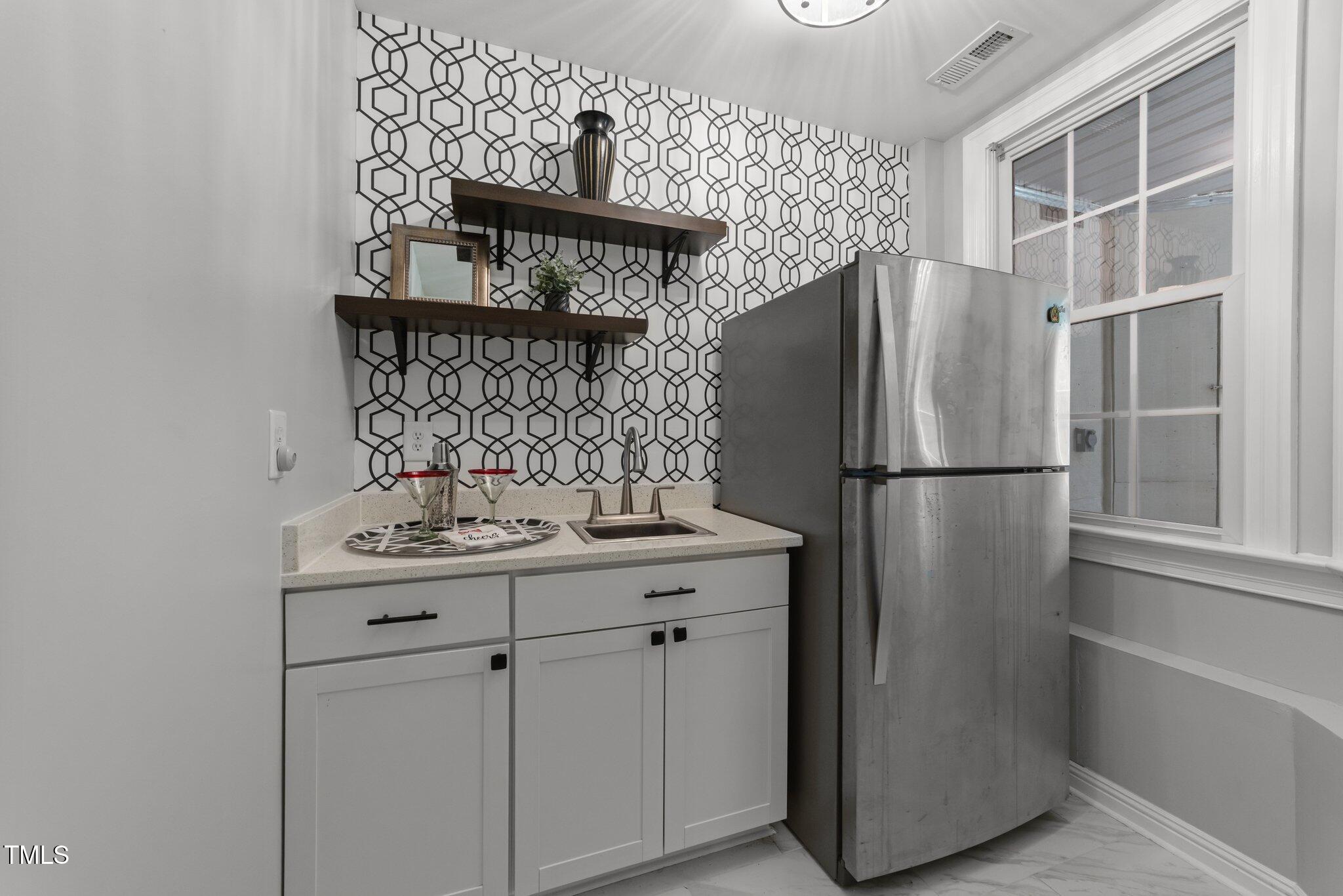 7000 Millstone Ridge Court Raleigh, NC 27614 - Photo 45 of 70 a kitchen with appliances and cabinets