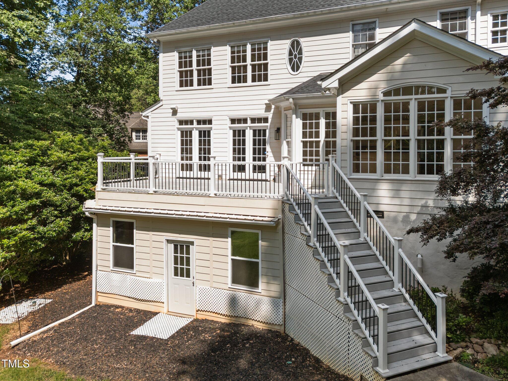 7000 Millstone Ridge Court Raleigh, NC 27614 - Photo 52 of 70 a front view of a house with a yard