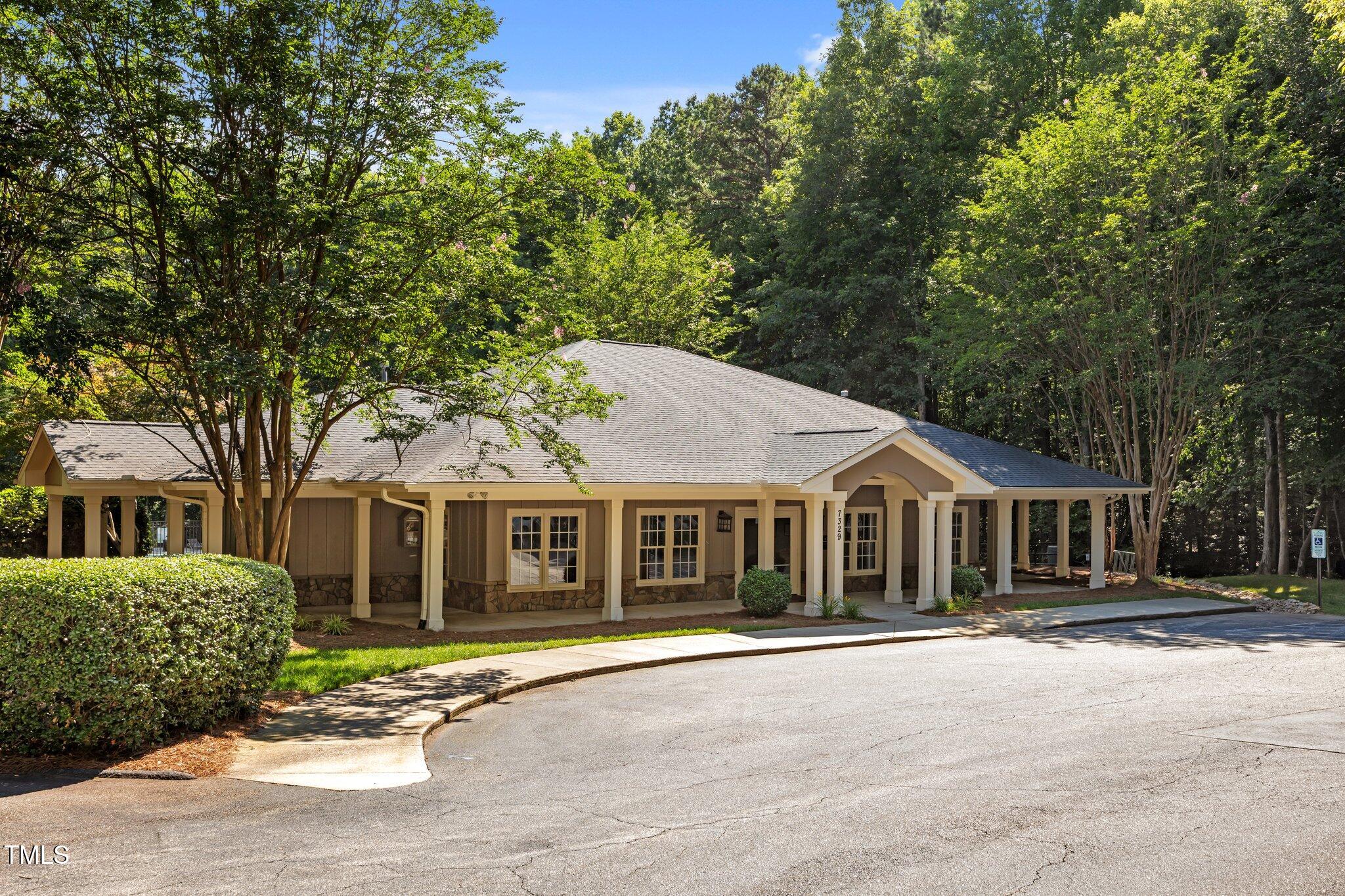 7000 Millstone Ridge Court Raleigh, NC 27614 - Photo 68 of 70 front view of a house with a patio