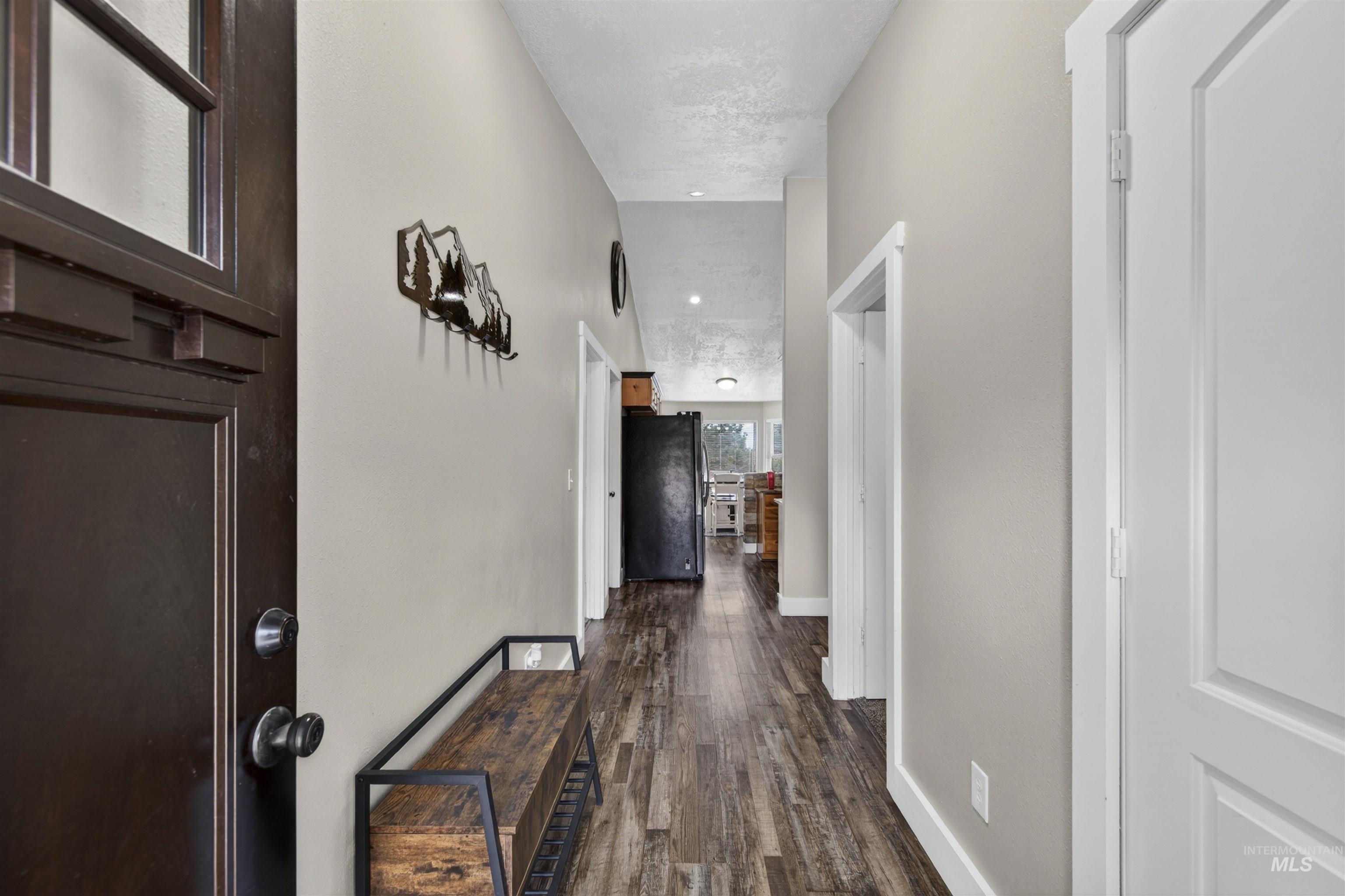 4 Round Up Circle Boise, ID 83716 - Photo 37 of 47 Entry hallway featuring wood-finish flooring, light neutral walls, and recessed lighting