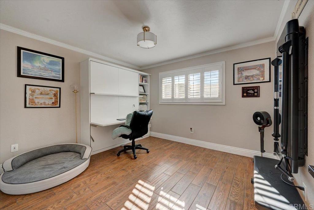 10321 Santana Ranch Drive Santee, CA 92071 - Photo 15 of 28 a view of a workspace with furniture and a window