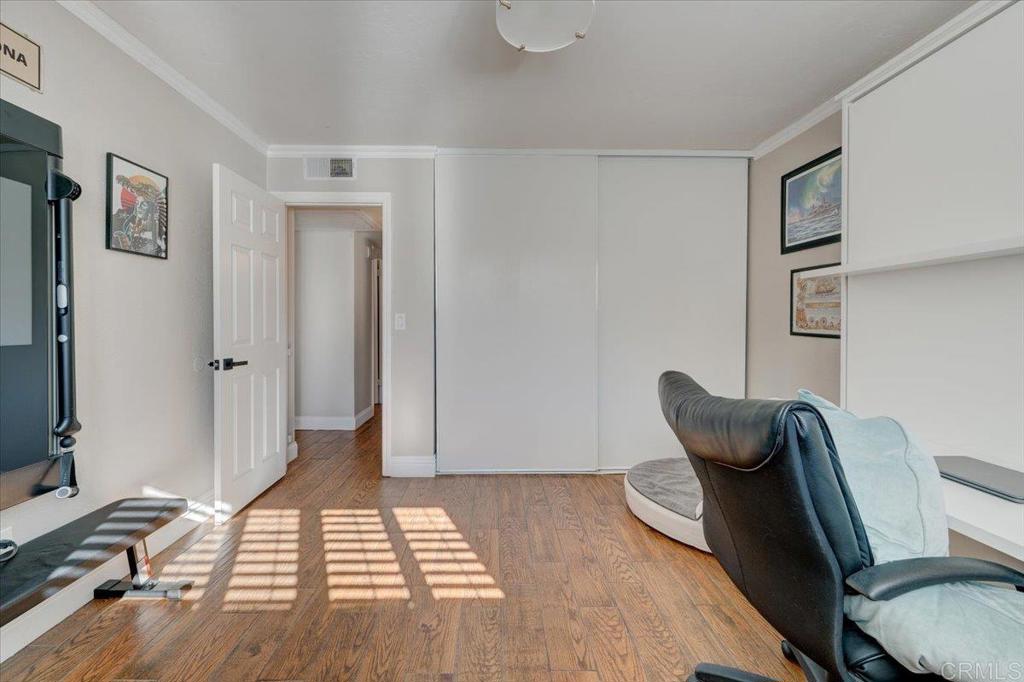 10321 Santana Ranch Drive Santee, CA 92071 - Photo 16 of 28 a living room with furniture and a wooden floor